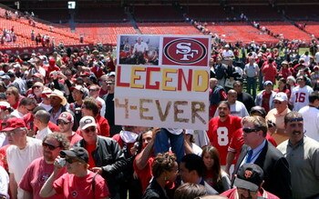 SAN FRANCISCO - AUGUST 10:  San Francisco 49ers fans hold a sign during a public memorial for former 49ers coach Bill Walsh August 10, 2007 at Monster Park in San Francisco, California. NFL Hall of Famer Bill Walsh, who was known by many as 'The Genius' f