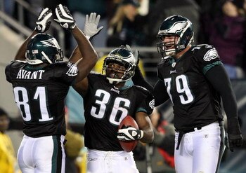 PHILADELPHIA - NOVEMBER 27:  (L-R) Jason Avant #81, Brian Westbrook #36 and Todd Herremans #79  of the Philadelphia Eagles celebrate Westbrook's third touchdown against the Arizona Cardinals at Lincoln Financial Field on November 27, 2008 in Philadelphia,