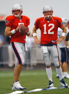 FOXBORO, MA - JULY 24:  Tom Brady #12 and Kevin O'Connell #5 of the New England Patriots participate in a drill during the first day of training camp at Gillette Stadium on July 24, 2008 in Foxboro, Massachusetts.  (Photo by Jim Rogash/Getty Images)