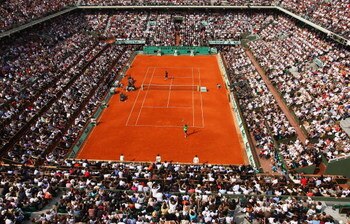 PARIS - JUNE 08:  A general view of Court Philippe Chatrier as Rafael Nadal of Spain celebrates winning matchpoint during the Men's Singles Final match against Roger Federer of Switzerland on day fifteen of the French Open at Roland Garros on June 8, 2008
