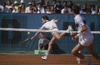 John McEnroe (left) and Ivan Lendl competing in the men's singles final of the Tournoi de Roland-Garros (French Open), at the Stade Roland Garros, Paris, June 1984. Lendl won the match 3-6, 2-6, 6-4, 7-5, 7-5.
(Photo by Steve Powell/Getty Images)
 
