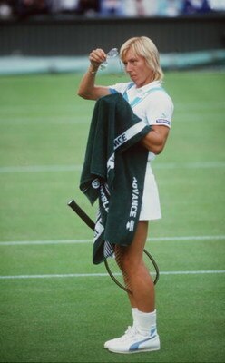 JULY 1985:  MARTINA NAVRATILOVA OF THE USA CHECKS HER GLASSES AS SHE GOES ON COURT AT WIMBLEDON. Mandatory Credit: Allsport UK/ALLSPORT