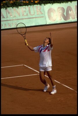 MAY 1989:  MICHAEL CHANG OF THE UNITED STATES CELEBRATES HIS WIN IN THE MEN's SINGLES AT THE 1989 FRENCH OPEN.