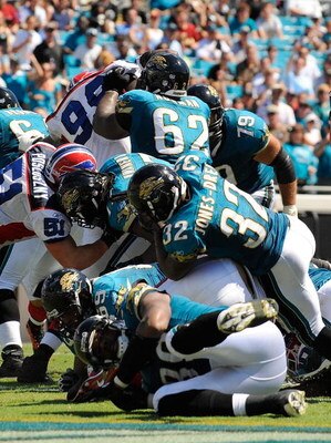 JACKSONVILLE, FL - SEPTEMBER 14:  Maurice Jones-Drew #32 of the Jacksonville Jaguars scores a touchdown in a game against the Buffalo Bills at Jacksonville Municipal Stadium on September 14, 2008 in Jacksonville, Florida.  (Photo by Sam Greenwood/Getty Im