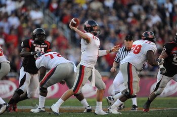 DALLAS - JANUARY 02:  Quarterback Jevan Snead #4 of the Mississippi Rebels drops back to pass against the Texas Tech Red Raiders during the AT&T Cotton Bowl on January 2, 2009 at the Cotton Bowl in Dallas, Texas.  (Photo by Ronald Martinez/Getty Images)