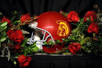 PASADENA, CA - JANUARY 01:  A USC Trojans helmet sits on a table surrounded by roses after USC defeated the Penn State Nittany Lions at the 95th Rose Bowl Game presented by Citi on January 1, 2009 at the Rose Bowl in Pasadena, California.  (Photo by Harry