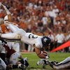 AUSTIN, TX - SEPTEMBER 20:  James Casey #12 of the Rice Owls dives during the game against the Texas Longhorns on September 20, 2008 at Darrell K Royal-Texas Memorial Stadium in Austin, Texas. Texas won 52-10. (Photo by Brian Bahr/Getty Images)