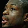 MIAMI - APRIL 25:  Dwyane Wade #3 of the Miami Heat cheers his team on from the bench in the fourth quarter against the Atlanta Hawks during Game Three of the Eastern Conference Quarterfinals at American Airlines Arena on April 25, 2009 in Miami, Florida.