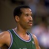 LOS ANGELES - 1989:  Adrian Dantley #4 of the Dallas Mavericks stands on the court during the NBA game against the Los Angeles Lakers at the Great Western Forum in Los Angeles, California in 1989.  (Photo by Stephen Dunn/Getty Images)