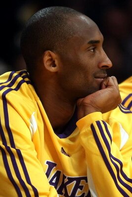 LOS ANGELES, CA - MAY 12:  Kobe Bryant #24 of the Los Angeles Lakers smiles on the bench late in the fourth quarter against the Houston Rockets in Game Five of the Western Conference Semifinals during the 2009 NBA Playoffs at Staples Center on May 12, 200