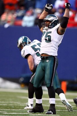 EAST RUTHERFORD, NJ - JANUARY 11:  Juqua Parker #75 of the Philadelphia Eagles reacts after a play against the New York Giants during the NFC Divisional Playoff Game on January 11, 2009 at Giants Stadium in East Rutherford, New Jersey.  (Photo by Al Bello