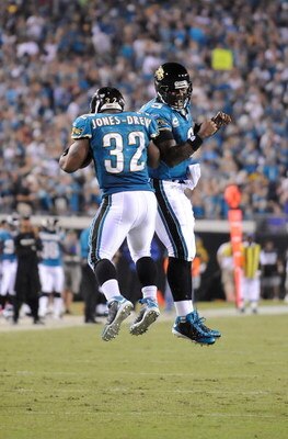 JACKSONVILLE, FL - OCTOBER 05:  David Garrard #9 and Maurice Jones-Drew #32 of the Jacksonville Jaguars celebrate after a touchdown in a game against the Pittsburgh Steelers at Jacksonville Municipal Stadium on October 5, 2008 in Jacksonville, Florida.  (