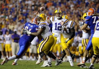 GAINESVILLE, FL - OCTOBER 11: Quarterback Jarrett Lee #12 of the LSU Tigers sets to pass against the Florida Gators at Ben Hill Griffin Stadium on October 11, 2008 in Gainesville, Florida.  (Photo by Al Messerschmidt/Getty Images) 