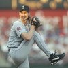19 Jun 1997:  Pitcher Randy Johnson of the Seattle Mariners winds up to throw a pitch during the Mariners 2-1 win over the Texas Rangers at the Ball Park in Arlington in Arlington, Texas. Mandatory Credit: Stephen Dunn  /Allsport