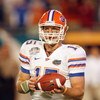 MIAMI - JANUARY 08:  Tim Tebow #15 of the Florida Gators looks to the sidelines against the Oklahoma Sooners during the FedEx BCS National Championship Game at Dolphin Stadium on January 8, 2009 in Miami, Florida.  (Photo by Eliot J. Schechter/Getty Image