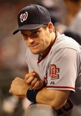 PHOENIX - MAY 08:  Josh Willingham #16 of the Washington Nationals looks on from the dugout during the game against the Arizona Diamondbacks at Chase Field on May 8, 2009 in Phoenix, Arizona. The Nationals defeated the Diamondbacks 5-4.  (Photo by Christi