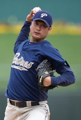 SURPRISE, AZ - MARCH 05:  Starting pitcher Cha Seung Baek #53 of the San Diego Padres pitches during the spring training game against the Texas Rangers at Surprise Stadium on March 5, 2009 in Surprise, Arizona. The Rangers defeated the Padres 4-3.  (Photo