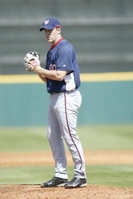 KISSIMMEE, FL MARCH 7:  Shawn Hill of the Washington Nationals pitches against the Houston Astros during a Spring Training game on March 7, 2007 at Osceola County Stadium in Kissimmee, Florida. The Astros won 5-2. (Photo by Rick Stewart/Getty Images)