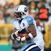 GREEN BAY, WI - AUGUST 28: LenDale White #25 of the Tenessee Titans runs for yardage against the Green Bay Packers on August 28, 2008 at Lambeau Field in Green Bay, Wisconsin. The Titans defeated the Packers 23-21. (Photo by Jonathan Daniel/Getty Images)