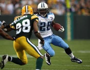 GREEN BAY, WI - AUGUST 28: Chris Johnson #28 of the Tenessee Titans runs against Tramon Williams #38 of the Green Bay Packers on August 28, 2008 at Lambeau Field in Green Bay, Wisconsin. (Photo by Jonathan Daniel/Getty Images)