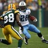 GREEN BAY, WI - AUGUST 28: Chris Johnson #28 of the Tenessee Titans runs against Tramon Williams #38 of the Green Bay Packers on August 28, 2008 at Lambeau Field in Green Bay, Wisconsin. (Photo by Jonathan Daniel/Getty Images)