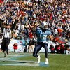 NASHVILLE, TN - DECEMBER 21:  Justin Gage #12 of the Tennessee Titans celebrates after scoring a touchdown against the Pittsburgh Steelers during their game on December 21, 2008 at LP Field in Nashville, Tennessee.  (Photo by Streeter Lecka/Getty Images)