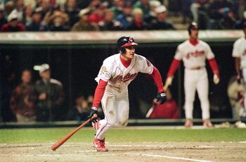 24 Oct 1995:  Omar Vizquel of the Cleveland Indians starts to run after hitting the ball during game three of the World Series against the Atlanta Braves at Jacob's Field in Cleveland, Ohio. The Indians defeated the Braves 7-6. Mandatory Credit: Otto Greu