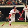 24 Oct 1995:  Omar Vizquel of the Cleveland Indians starts to run after hitting the ball during game three of the World Series against the Atlanta Braves at Jacob's Field in Cleveland, Ohio. The Indians defeated the Braves 7-6. Mandatory Credit: Otto Greu