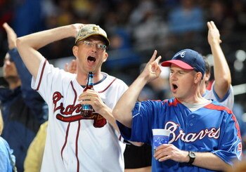 ATLANTA - APRIL 10: Fans of the Atlanta Braves cheer play against the Washington Nationals April 10, 2009 in Atlanta, Georgia.  (Photo by Al Messerschmidt/Getty Images)