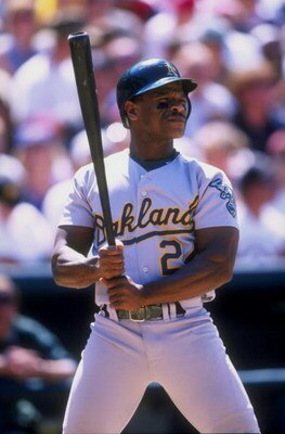 28 Jun 1998:  Rickey Henderson #24 of the Oakland Athletics looks on during an interleague game against the Colorado Rockies at Coors Field in Denver, Colorado. The Rockies defeated the Athletics 11-10. Mandatory Credit: Brian Bahr  /Allsport