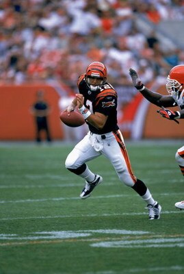 CLEVELAND - SEPTEMBER 15:  Quarterback Gus Frerotte #12 of the Cincinnati Bengals rolls to his right during the NFL game against the Cleveland Browns on September 15, 2002 at Cleveland Browns Stadium in Cleveland, Ohio.  The Browns won 20-7.  (Photo by Pa