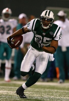 EAST RUTHERFORD, NJ - DECEMBER 28:  Kerry Rhodes #25 of The New York Jets intercepts the ball against The Miami Dolphins during their game on December 28, 2008 at Giants Stadium in East Rutherford, New Jersey.  (Photo by Al Bello/Getty Images)