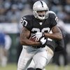 OAKLAND, CA - AUGUST 23:  Running back Darren McFadden #20 of the Oakland Raiders heads downfield against the Arizona Cardinals during a preseason game on August 23, 2008 at the McAfee Coliseum in Oakland, California.  (Photo by Greg Trott/Getty Images)