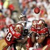 SAN FRANCISCO - OCTOBER 28:  Quarterback Drew Brees #9 of the New Orleans Saints is hit as he throws a pass by linebacker Parys Haralson #98 of the San Francisco 49ers during a game at Monster Park October 28, 2007 in San Francisco, California. New Orlean