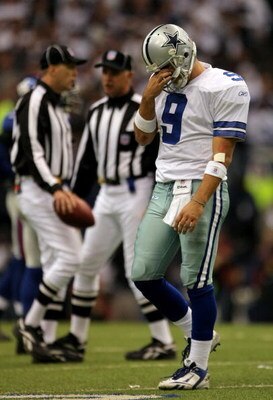 IRVING, TX - JANUARY 13:  Quarterback Tony Romo #9 of the Dallas Cowboys reacts after an intentional grounding penalty during the fourth quarter of the NFC Divisional Playoff game against the New York Giants at Texas Stadium on January 13, 2008 in Irving,