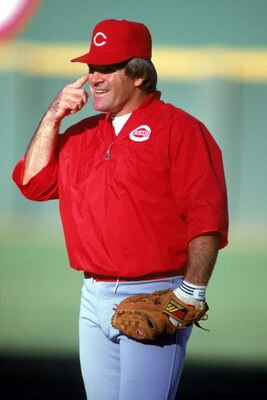 SAN DIEGO, CA - 1986:  Pete Rose #14 of the Cincinnati Reds points to his head during batting practice prior to the game against the San Diego Padres at Jack Murphy Stadium during the 1986 MLB season in San Diego, California.  (Photo by Stephen Dunn/Getty