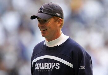 IRVING, TX - JANUARY 13:  Offensive coordinator Jason Garrett of the Dallas Cowboys walks on the field during warm ups to the NFC Divisional Playoff game against the New York Giants at Texas Stadium on January 13, 2008 in Irving, Texas.  (Photo by Ronald 