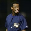 SAN DIEGO- JULY 19:  Rickey Henderson, who plays baseball for the San Diego Surf Dawgs of the Golden League, an independent professional baseball organization, sticks his tounge out after making an out at a game at Tony Gwyn Stadium in San Diego, Californ