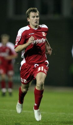 SWINDON, UNITED KINGDOM - OCTOBER 21:    Simon Cox of Swindon Town in action during the Coca Cola League One Match between Swindon Town and Northampton Town at the County Ground on October 21, 2008 in Swindon, England. (Photo by Pete Norton/Getty Images)