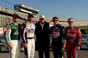 DAYTONA BEACH, FL - FEBRUARY 07:   Dale Earnhardt Jr., Jimmie Johnson, Rick Hendrick, Jeff Gordon, and Mark Martin pose for the media prior to practice for the NASCAR Sprint Cup Series Daytona 500 at Daytona International Speedway on February 7, 2009 in D