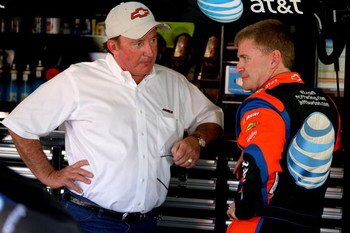 KANSAS CITY, KS - SEPTEMBER 26:  Owner Richard Childress confers with driver Jeff Burton during practice for the NASCAR Sprint Cup Series Camping World RV 400 at Kansas Speedway on September 26, 2008 in Kansas City, Kansas.  (Photo by Matthew Stockman/Get