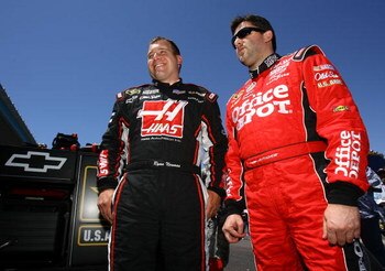 AVONDALE, AZ - APRIL 17:  Ryan Newman (L) driver of the #39 Haas Automation Chevrolet talks with Tony Stewart, driver of the #14 Office Depot/ Old Spice Chevrolet, during practice for the NASCAR Sprint Cup Series SUBWAY Fresh Fit 500 at Phoenix Internatio