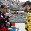 DARLINGTON, SC - MAY 08:  Brian Vickers (R), driver of the #32 Dollar General Toyota, talks with Scott Speed, driver of the #99 Red Bull Toyota, on the grid prior to the NASCAR Nationwide Series Diamond Hill Plywood 200 on May 8, 2009 at Darlington Racewa