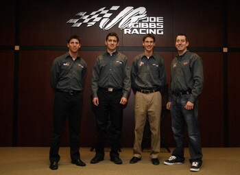 CONCORD, NC - JANUARY 20:  Joe Gibbs Racing drivers (L-R) Denny Hamlin, driver of the #11 FedEx Toyota, Brad Coleman, driver of the Nationwide Series #20 Toyota, Joey Logano, driver of the #20 Home Depot Toyota, and Kyle Busch, driver of the #18 M&M's Toy