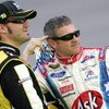RICHMOND, VA - MAY 01:  Paul Menard (L), driver of the #98 Nibco/Menards Ford, talks with teammate Bobby Labonte (R), driver of the #96 Ask.com Ford, during qualifying for the NASCAR Sprint Cup Series Crown Royal Presents the Russ Friedman 400 at Richmond