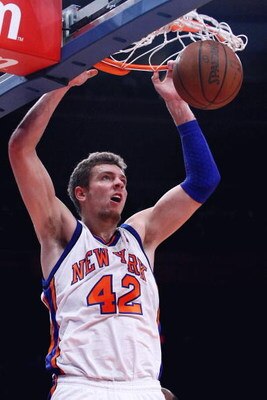 NEW YORK - FEBRUARY 25:  David Lee #42 of the New York Knicks dunks against the Orlando Magic at Madison Square Garden February 25, 2009 in New York City. NOTE TO USER: User expressly acknowledges and agrees that, by downloading and/or using this Photogra
