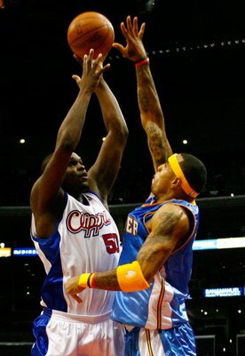 LOS ANGELES, CA - NOVEMBER 26:  Zach Randolph #50 of the Los Angeles Clippers shoots over Kenyon Martin #4 of the Denver Nuggets during the second half at Staples Center on November 26, 2008 in Los Angeles, California. The Nuggets defeated the Clippers 10