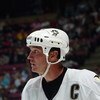 EAST RUTHERFORD, NJ - OCTOBER 5:  Mario Lemieux #66 of the Pittsburgh Penguins looks on during a break in action against the New Jersey Devils during their NHL opening night game at the Continental Airlines Arena on October 5, 2005 in East Rutherford, New