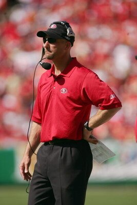 KANSAS CITY, MO - OCTOBER 1:  Quarterback coach Jim Hostler of the San Francisco 49ers looks on against the Kansas City Chiefs at Arrowhead Stadium on October 1, 2006 in Kansas City, Missouri. The Chiefs defeated the Niners 41-0.  (Photo by Doug Pensinger