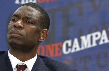 PHILADELPHIA, PA - MAY 16:  Dikembe Mutombo speaks at the launch of The 'One'  Campaign to Fight Global Aids and Poverty May 16, 2004 in Philadelphia, Pennsylvania. Activists including Mutombo, U2's Bono, Christian musician Michael W. Smith, Reverend Davi